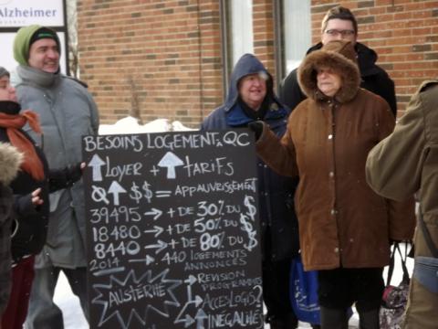 Des militant-e-s du FRAPRU se sont rendu aux bureaux de comté des ministres Bolduc et Blais pour leur faire une démonstration sur l'importance du seul programme de développement de logement social québécois : AccèsLogis.